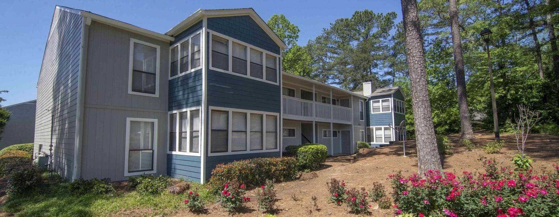 an apartment with landscaping