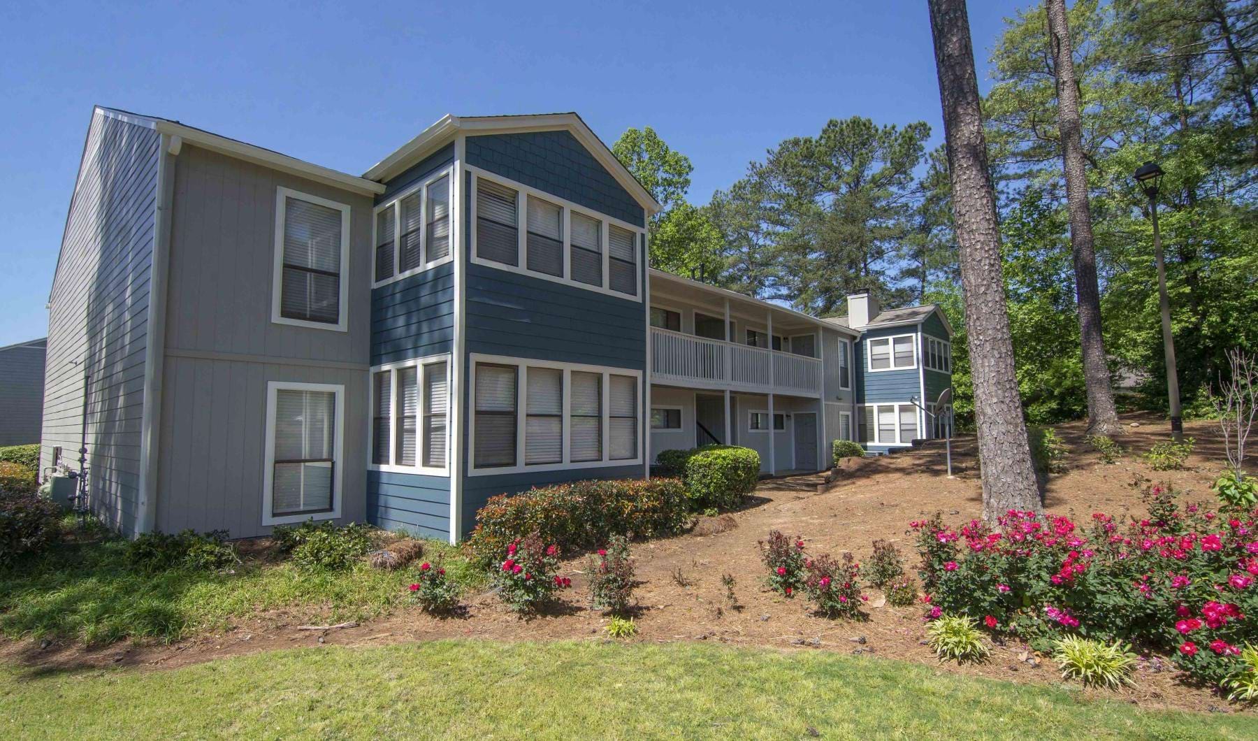 an apartment with landscaping