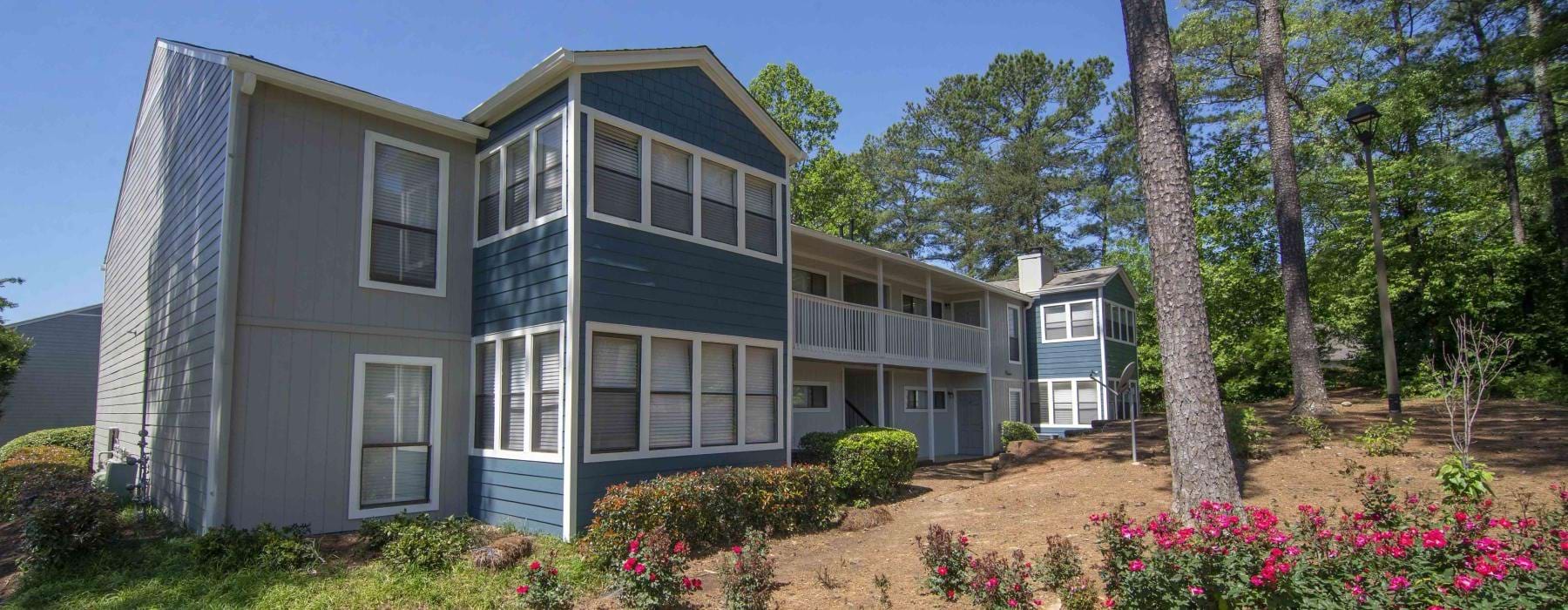 an apartment with landscaping
